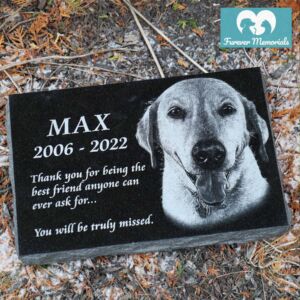 Black granite flat pet memorial marker engraved with a portrait of Max the dog, including the inscription “Thank you for being the best friend anyone can ever ask for… You will be truly missed.” and the dates 2006–2022.