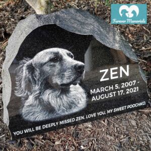Rustic black granite pet memorial engraved with a detailed portrait of Zen the dog, including the inscription “You will be deeply missed Zen. Love you, my sweet poochko.” and the dates March 5, 2007 – August 17, 2021.